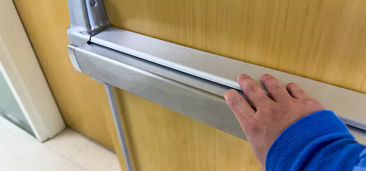 Installing a Push Bar on a Door Lake in the Hills